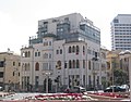 בית אוסישקין בפינת הרחובות אלנבי פינת והירקון עם תוספת בנייה מעל הסגנון האקלקטי