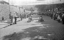 Racers hurdling down Duluth Ave, W. through Fletcher's Field, 1948 Feature. Coaster Classic BAnQ P48S1P16607.jpg