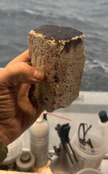 This fire brick was recovered from the wreck site. Pacific's boilers certainly used this type of material. Note the dark soot on the end that faced the coal fires. Firebrick Recovered From North Pacific Ocean.png