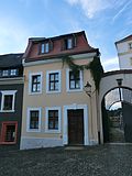 Residential house in closed development, corner house with Schwibbogen to Vogtshof