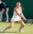 Gabriella Taylor competing in the first round of the 2015 Wimbledon Qualifying Tournament at the Bank of England Sports Grounds in Roehampton, England. The winners of three rounds of competition qualify for the main draw of Wimbledon the following week.