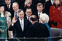 Chief Justice William Rehnquist administers the Presidential Oath of Office to George H. W. Bush George H. W. Bush inauguration.jpg