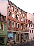 Two apartment buildings in closed development and side wings to the courtyard