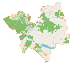 Mapa konturowa gminy Gomunice, blisko centrum na lewo u góry znajduje się punkt z opisem „Gomunice”