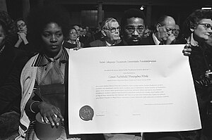 Moeletsi Mbeki receives Govan Mbeki's honorary doctorate (Amsterdam, 1978) GovanMbekiHonoraryDoctorateAmsterdam1978.jpg