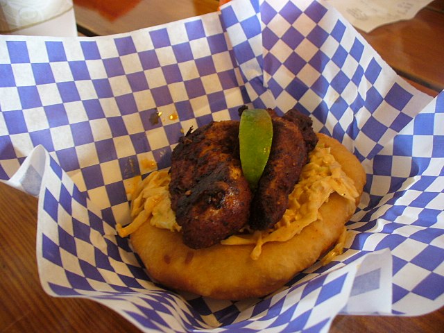 A fish taco served on fry bread in Alaska