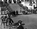 The caparisoned, riderless horse named "Black Jack" during a departure ceremony held at the United States Capitol Building in conjunction with the state funeral of John F. Kennedy, 1963.