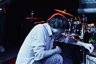 Maus performing with his band in support of Screen Memories, 2018. John Maus --- Marquis Theater --- 01.19.18 (38925866125).jpg