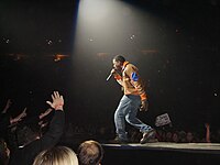 West performing on U2's Vertigo Tour in late 2005 Kanye West Portland Vertigo Tour 2005.jpg