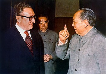 Henry Kissinger and Chairman Mao, with Zhou En...