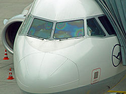 Thin film interference caused by ITO coating on an Airbus cockpit window, used for defrosting. LHcockpitWindow.jpg