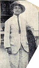 Capetillo wearing men's clothes