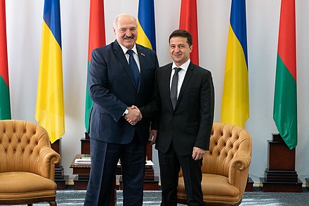 Volodymyr Zelensky shaking hands with Lukashenko in Zhytomyr, October 2019.