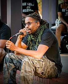 Mac Smiff speaking at a Black Lives Matter event in North Portland, August 2020 Mac Smiff at Peninsula Park.jpg