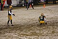 Green Bay Packers kicker w:Mason Crosby prepared to kick a fieldgoal against the Pittsburgh Steelers with holder Tim Masthay.   This file was uploaded with Commonist.