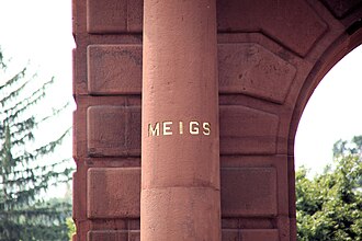 Brig. Gen. Montgomery C. Meigs had his name carved into a pillar on the gate. McClellan Gate - detail of pillar - Arlington National Cemetery - 2011.JPG