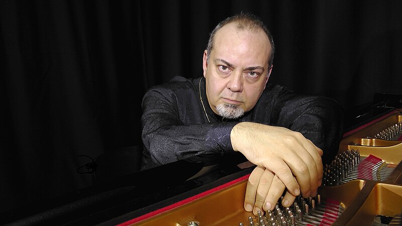 File:Mehmet Okonsar Portrait w Piano Cam4 ConcertShirt-hands-fromDownside-hands.JPG