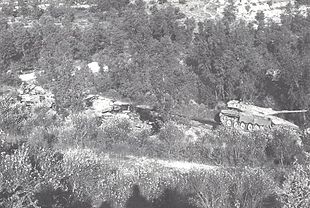 Israeli Merkava tank of Captain Tzur Maor passing two T-62 tanks which he destroyed, near Jezzine, a few minutes before Maor was killed when the tank was ambushed Merkavah Tank of Tzur Maor with destroyed Syrian tanks.jpg