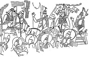 Knights wearing lamellar helmets depicted in the "Cave of the Painters" at the Kizil Caves, 5th century CE. The sword guards have typical Hunnish designs of rectangle or oval shapes with cloisonne ornamentation . Mural with warriors, Cave of the Painters, Kizil Caves (detail).jpg