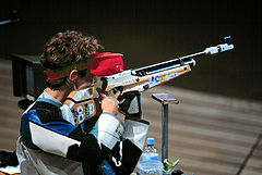 Olympic gold medalist Nancy Johnson aims carefully as she competes in the women's 10 m Air Rifle competition at the 2000 Summer Olympics in Sydney
