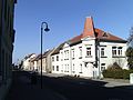 Apartment building in half-open development