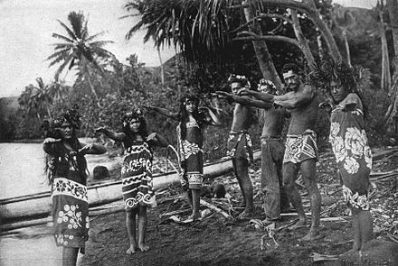 Marquesans dressed in pareu demonstrating traditional dance, 1909
