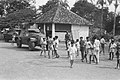 Braat Overvalwagen (background, partially obscured) and Marmon-Herrington Mk III (foreground) of KNIL 1st Infantry Battalion in Tangerang, May 1946.