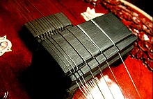 Ebony jivari of a sitar Sitar jawari.jpg