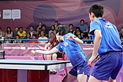 Deutsch: Tischtennis bei den Olympischen Jugendspielen 2018; Tag 9, 15. Oktober 2018; Mixed, Finale, Mixed-Doppel – Miu Hirano & Tomokazu Harimoto (JPN) gegen Sun Yingsha & Wang Chuqin (CHN) 1:3 English: Table tennis at the 2018 Summer Youth Olympics at 15 October 2018 – Mixed Final, Mixed-Double – Miu Hirano & Tomokazu Harimoto (JPN) Vs Sun Yingsha & Wang Chuqin (CHN) 1:3