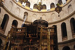 The Edicule of the Holy Sepulchre (The traditional location of Jesus' tomb) with the dome of the rotunda visible above. Tomb of christ sepulchre.jpg