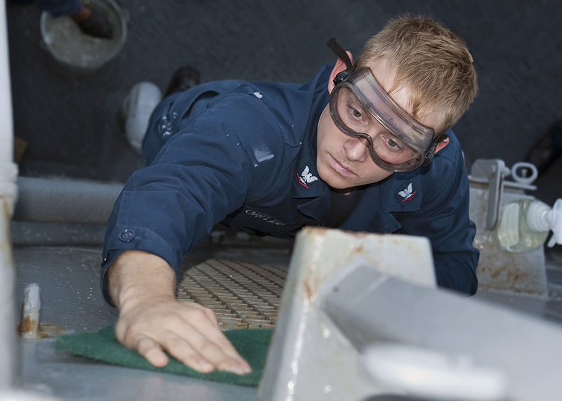 File:US Navy 110923-N-FI736-047 Hospital Corpsman 3rd Class Logan Ortlieb cleans the bulkhead on the weather decks of the guided-missile destroyer USS A.jpg