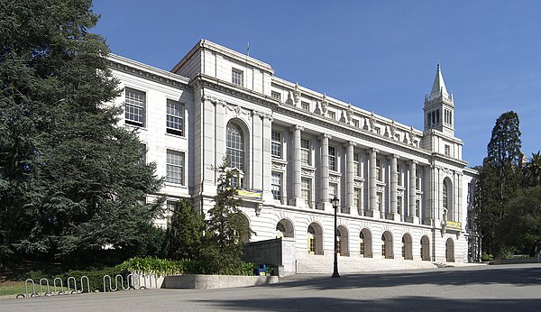 Wheeler Hall at the University of California, Berkeley, designed by Howard and completed in 1917. In the background is Sather Tower, completed by Howa