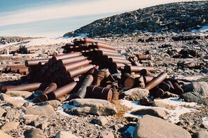 Photograph shows a number of discarded hydrogen gas cylinders used for meteorological analysis at Wilkes Station in the late 1950s and early 1960s. 1988 Gas cylinders at Wilkes.TIF