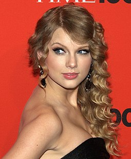 Taylor Swift topped the chart twice in 2009 with "Love Story" and "You Belong with Me". 5.3.10TaylorSwiftByDavidShankbone.jpg