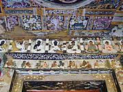 Ajanta cave 17, frescoes above a lintel.JPG