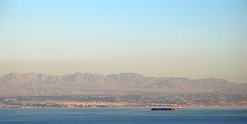 Haql on the coast of the Gulf of Aqaba between the Syrian region and Arabian and Sinai Peninsulas, with the mountains in the background