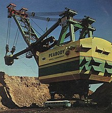 The Bucyrus Erie 3850-B power shovel named "Big Hog" went to work next door to Paradise Fossil Plant for Peabody Coal Company's Sinclair surface mine in 1962. When it started work it was received with grand fanfare and was the largest shovel in the world with a bucket size of 115 cubic yards (88 m). After it finished work in the mid-1980s, it was buried in a pit on the mine's property. Bighog1wiki.jpg