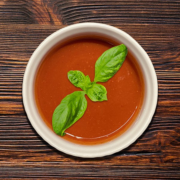 Hot sauce with basil leaves
