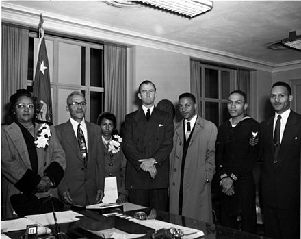 Pace (center) with the family of Medal of Honor recipient Cornelius H. Charlton in 1952.