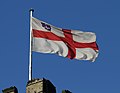 A flag with the St.George’s Cross in North Wingfield (England)