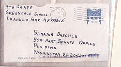 A letter sent to Senate Majority Leader Tom Daschle containing anthrax powder caused the deaths of two postal workers. Daschle letter.jpg