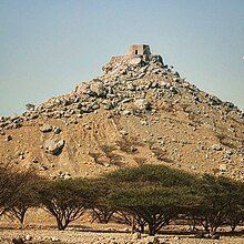 Dhayah Fort at the hill top. In 1819 it was the last Al-Qasimi stronghold to fall in the Persian Gulf campaign of 1819. The fall of Dhayah was to pave the way for the signing of the General Maritime Treaty of 1820. Dhayah Fort showing hilltop location.jpg
