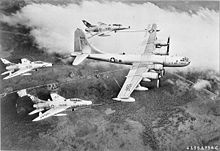 Boeing B-KB50D Superfortress 48–123 of Air Proving Ground Command carrying out first triple-point refuelling operation with three North American F-100C Super Sabres (54-1825, 53–1774, 54–1848) of the 451st Fighter Day Squadron (322d FDG), 1956