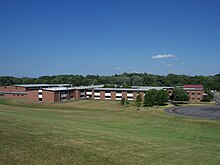 Fairport High School looking east FairportHighSchoolPerintonNewYorkWestView.jpg