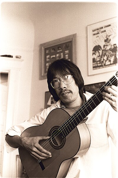 File:Frank Chin plays the guitar in his San Francisco apartment in 19.jpg