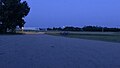 Full Moon rising over Ancient Echoes Interpretive Centre in Herschel, Saskatchewan.jpg