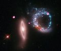 Giant Ring of Black Holes- A galaxy about 430 million light years from Earth. (6261055049).jpg