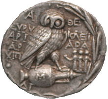 The owl of Athena, surrounded by an olive wreath. Reverse of an Athenian silver tetradrachm, c. 175 BC Greek coin tetradrachme panathenaic games.jpg