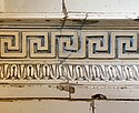 Greek key tiles on a stove in a house from Bucharest (Romania)