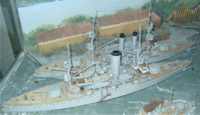 Models of the coastal defense ships Tordenskjold and Eidsvold. Tordenskjold in the front. HNoMS Eidsvold and HNoMS Tordenskiold (models).png